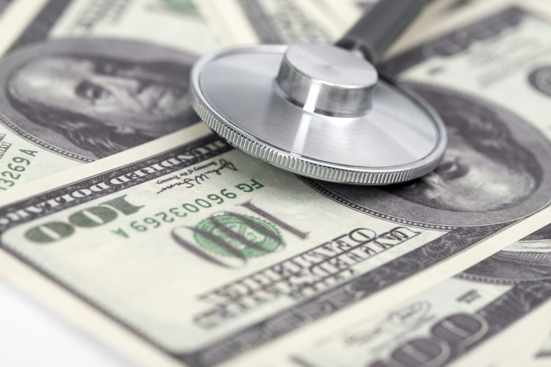 Stethoscope on the background of the dollar